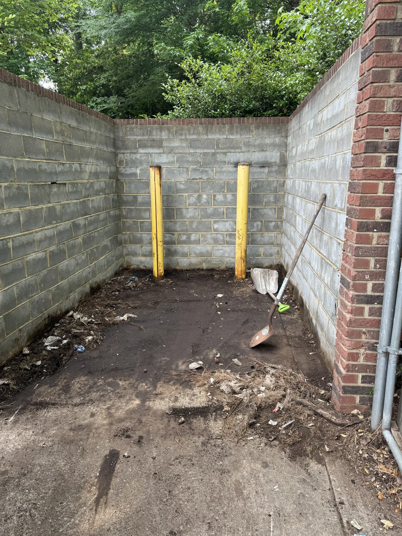 Cleared dumpster corral after A-Z cleanup